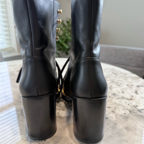 Stuart Weitzman Black Lace-Up Boots with Gold Accents - Picture 2 of 11